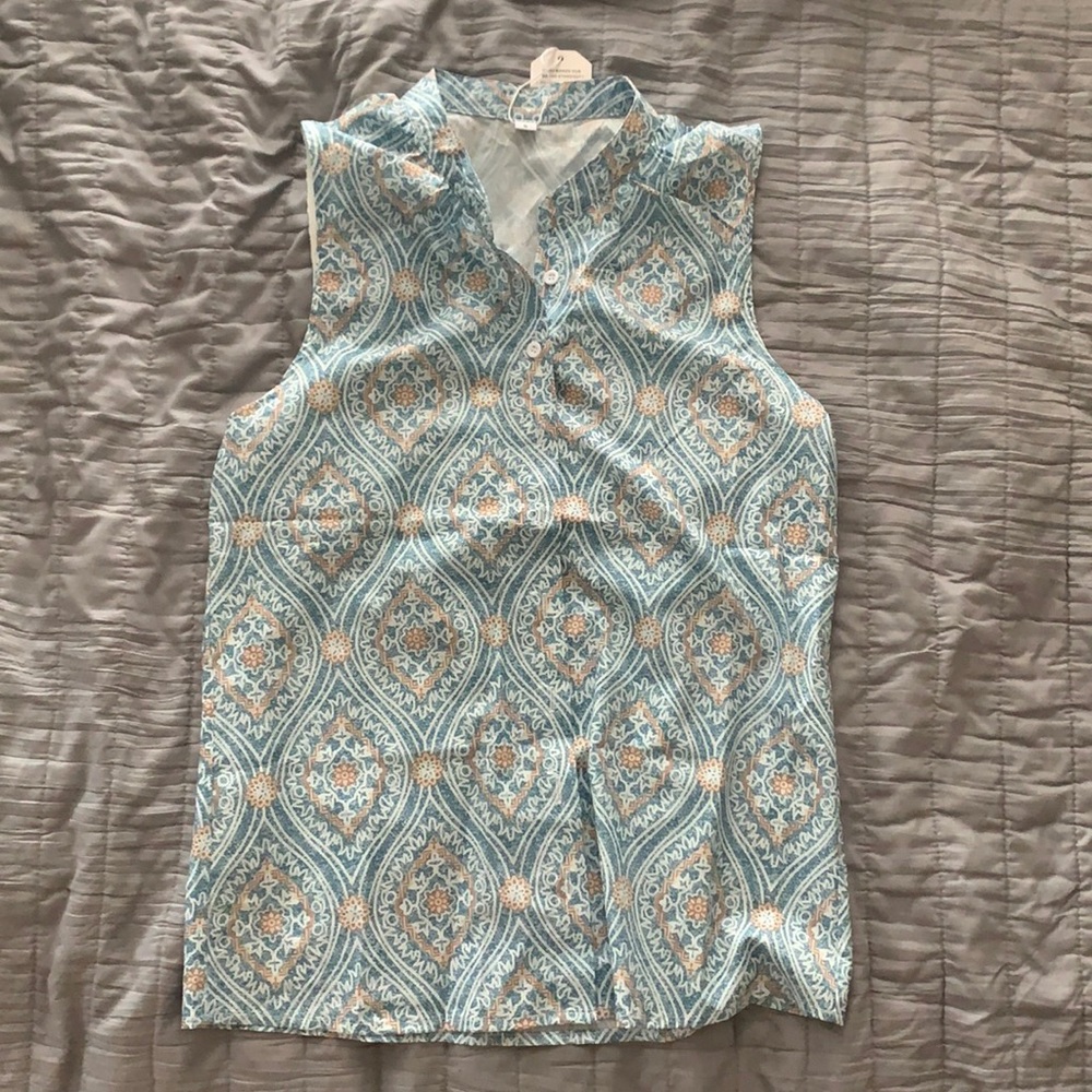Multi-colored sleeveless top button-down top. Brand new.